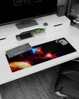 Molten planet cracking with fiery red and orange lava on a space mouse pad 32x12 inches, moon above.