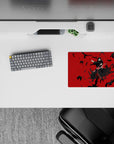 14x10 inches mouse pad with Itachi Uchiha, surrounded by crows against a red backdrop, perfect for Naruto fans.