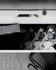 Grayscale 36x16 desk pad featuring Misato Katsuragi’s bold energy and charisma in a striking noir-inspired design