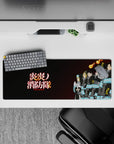 Black-coat Fire Force mouse pad 32x12 inches with turquoise bands, glowing kanji, warm ember tones.