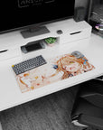 Winking catgirl with tiny floating kitten, paws up, on an anime desk mouse pad 28x12 inches.