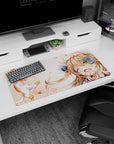 32x16 inches desk mouse pad showing giggly catgirl winking as a tiny kitten floats in with paws up.