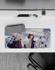 Cool blue and gray anime mouse pad 28x12 inches with icy glow, orange accents, comfy gaming vibe.
