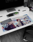 Silver-haired anime girl with red accents, shield gear, plus teammates on desk pad 36x16 inches.