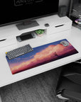 32x12 inches mouse pad featuring a lone anime girl gazing at the sky under sunset clouds and sparks.
