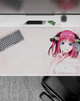 40x20 inches anime desk pad in magenta and ocean-blue with cozy romance vibes over a clean white outfit.