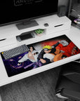 Naruto and Sasuke on 36x16 inch anime mouse pad, featuring Kurama and Susanoo in vivid red and purple, iconic clash scene.