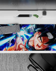 Sleek 36x16 inch desk pad featuring Goku's explosive attack and raw power for anime enthusiasts