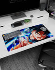 Durable 32x16 inch mouse pad with Goku's Kamehameha design, bringing intensity to any workspace