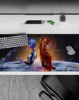 36x16 inches mouse pad with Rei Ayanami and Asuka Langley Shikinami, showcasing a cosmic sunrise in deep blues and fiery oranges for powerful symbolism.
