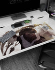 Gaara from Naruto reaching forward as sand curls around his gourd on a 40x20 inches anime desk pad.
