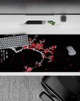 36x16 inches desk pad with plum blossoms, capturing the contrast of vivid red flowers and snow-covered branches for a stunning, hopeful design.