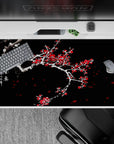 40x20 inches desk pad with plum blossoms, showcasing snow-covered branches and vivid red flowers, symbolizing strength and hope during winter.