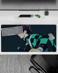 Anime mouse pad 32x16 inches featuring Tanjiro from Demon Slayer, showcasing his teal-black haori on a navy-blue background.