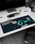 Anime desk pad 36x16 inches featuring Tanjiro from Demon Slayer, showcasing his teal-black haori on a navy-blue background.