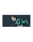 Anime mouse pad 28x12 inches featuring Tanjiro from Demon Slayer in his teal-black haori against a navy-blue background.