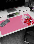 Large 40x20 inches mouse pad featuring bold, minimalist silhouette in pink and red hues, with clean vector lines for a modern and sleek anime setup.