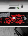 36x16 inches mouse pad with Uchiha Clan design, showcasing red clouds, Sharingan symbols, and Uchiha fan with a striking black background for power.