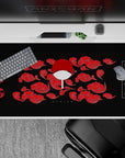40x20 inches mouse pad with Uchiha Clan design, showcasing Sharingan symbols and Uchiha fan with fiery red clouds and a bold black backdrop.