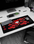 Artistic 36x16 inches mouse pad featuring Uchiha Clan design, with fiery red clouds, Sharingan symbols, and Uchiha fan for a strong anime vibe.