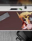 Warm sunset orange, gold, blush pink anime desk pad 40x20 inches with dreamy faces and smoky ribbons.