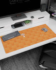 Desk pad 36x16 inches showing a tiny scarfed anime girl popping up among sleepy orange hamsters.