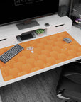 40x20 inches anime desk pad showing a tiny rosy-cheek girl among sleepy orange hamsters on a desk.