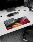 Spiral galaxy scene mouse pad 28x12 inches featuring a drifting nebula sky over a glowing horizon.