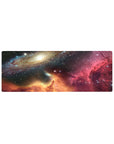 Cosmic galaxy desk mouse pad 32x12 inches with nebula swirl and starry night horizon glow.