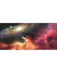 Galaxy swirl desk pad 36x16 inches with nebula horizon glow and starry space background.