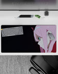 Minimalist 32x16 mouse pad featuring piercing teal eyes, confident smirk, and dark gradient for bold desk style
