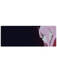 Bold 32x12 anime mouse pad featuring piercing teal eyes and confident smirk, with dark gradient background for sleek look