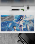 32x16 inches anime desk mat in soft pastels and sky-blue glow, sparkly highlights, carefree summer vibe.