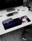 Dark-haired anime girl with violet eyes in black lace beside starry specks on 32x12 inches mouse pad.