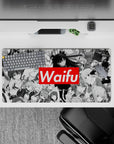 32x16 inches manga-style desk mat in grayscale with crisp line shading and a candy-red Waifu pop.