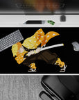 Anime desk pad 40x20 inches featuring Zenitsu from Demon Slayer, showcasing his iconic orange haori and fierce stance.