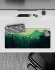 28x12 inches mouse pad with forest explorer, showcasing evergreen trees and distant peaks for a tranquil, adventurous effect.
