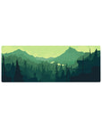 Compact 32x12 inches mouse pad with forest explorer, showcasing lush valley and evergreen trees for a calming, peaceful desk setup.