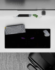 Dark moody anime mouse pad 28x12 inches in deep blacks with orange-brown accents and violet glow.