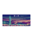 Mouse pad featuring a cyberpunk skyline, 28x12 inches, with neon lights and a pixelated design for a retro-futuristic vibe.