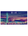 Mouse pad featuring a pixelated cyberpunk skyline, 32x16 inches, with neon lights for a retro-futuristic, vaporwave look.