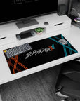 Modern 32x16 inches mouse pad featuring Darling in the Franxx logo, with bold XX patterns in red and blue against a black background for a stylish look.