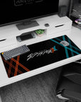 Artistic 36x16 inches mouse pad featuring Darling in the Franxx logo, with red and blue XX patterns on a deep black background for a futuristic vibe.