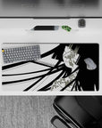 Black-and-white anime girl mouse pad with soft blush and floral accents, 32x16 inches.