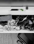 36x16 inches desk pad showcasing Guts facing the Beast of Darkness, with black-and-white design reflecting inner turmoil and dark contemplation.