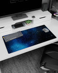 Space scene mouse pad, 32x16 inches, featuring bright starbursts and tiny sparkles across a dark sky.