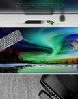 40x20 inches mouse pad with the northern lights dancing over a frozen lake, blending green, blue, and purple shades for a peaceful vibe.