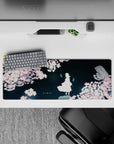 32x12 inches anime desk mat in deep teal, soft pink sakura, and cyan spirit flames, calm night mood.