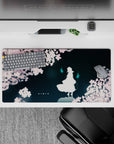 32x16 inches anime desk mat in deep teal and soft pink, calm late-night mood with subtle haunting glow.