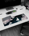 32x12 inches anime mouse pad showing a lone white figure under sakura with two cyan spirit flames hovering.